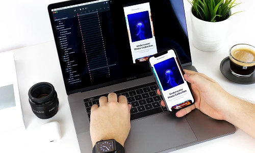 Mobile application preview on a laptop and smartphone